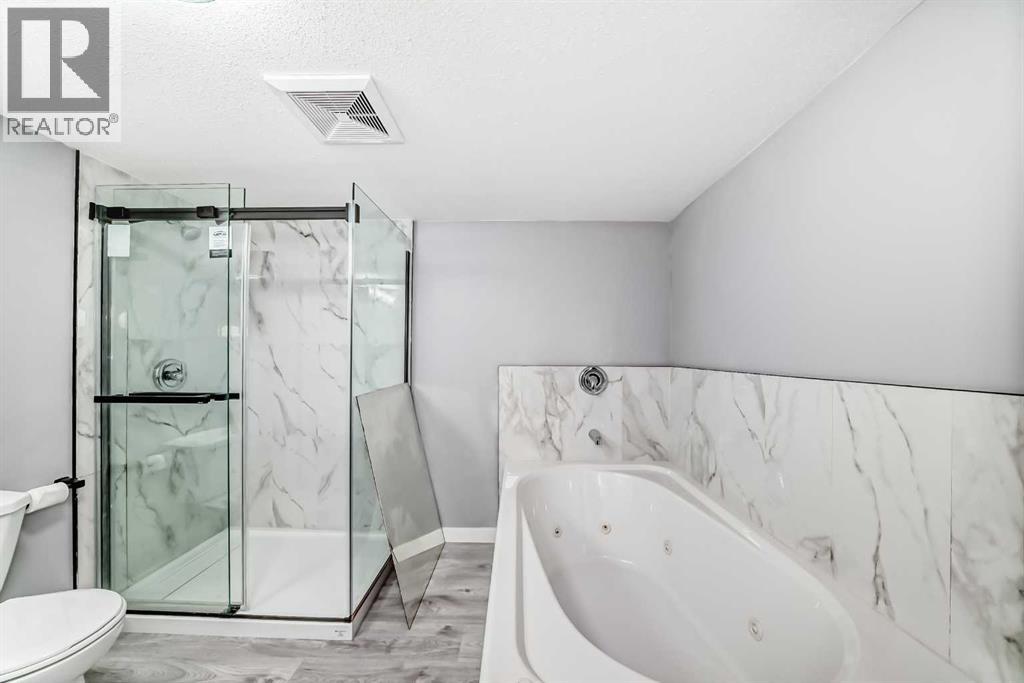 Single Family House Bi-level for Sale in  Shawfield Way SW Shawnessy Calgary 
