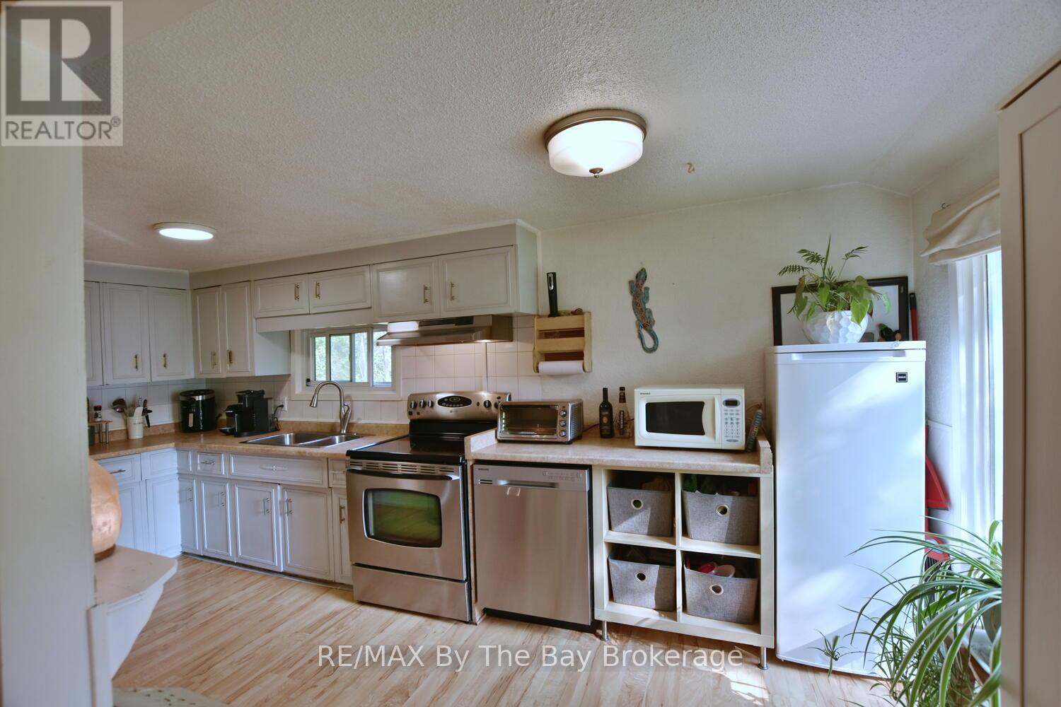 Photo 14 of 103 Sunnidale Road S, Wasaga Beach ON