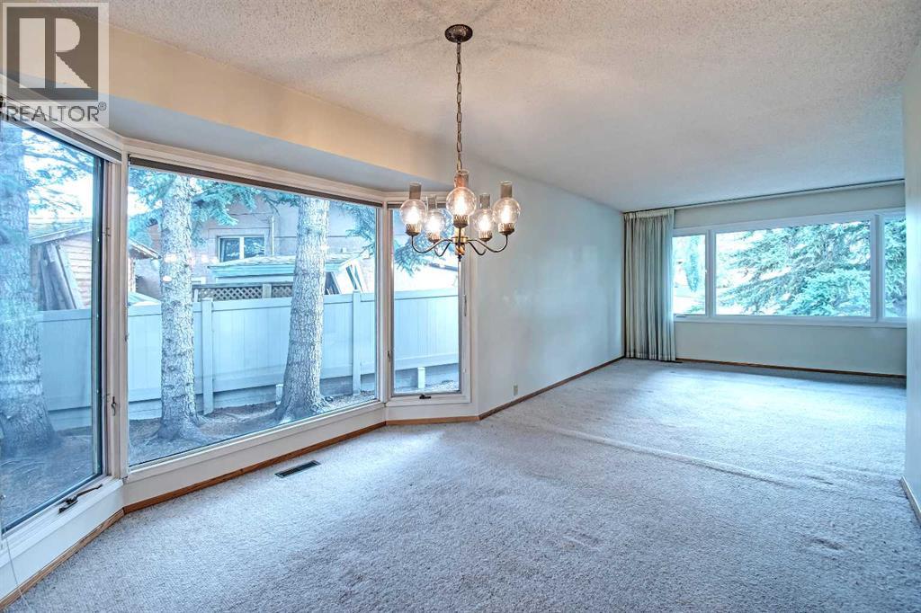 Single Family House 4 Level for Sale in  Lake Acadia Place SE Lake Bonavista Calgary 