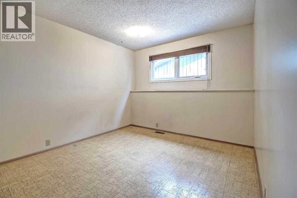Single Family House 4 Level for Sale in  Lake Acadia Place SE Lake Bonavista Calgary 