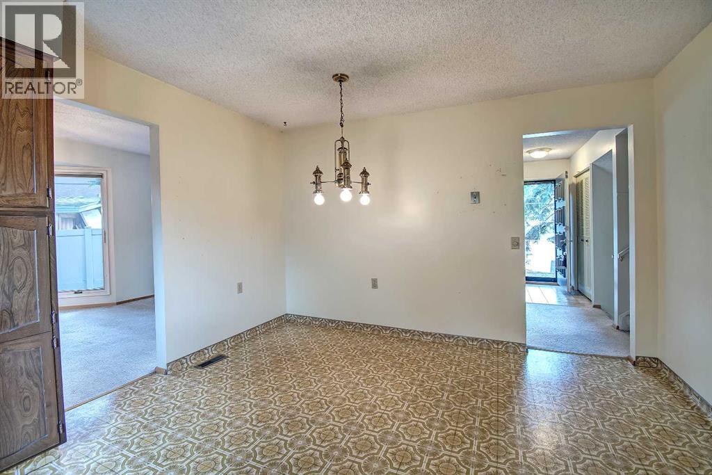 Single Family House 4 Level for Sale in  Lake Acadia Place SE Lake Bonavista Calgary 