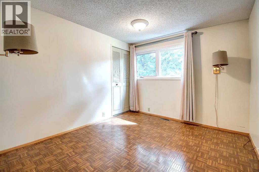 Single Family House 4 Level for Sale in  Lake Acadia Place SE Lake Bonavista Calgary 