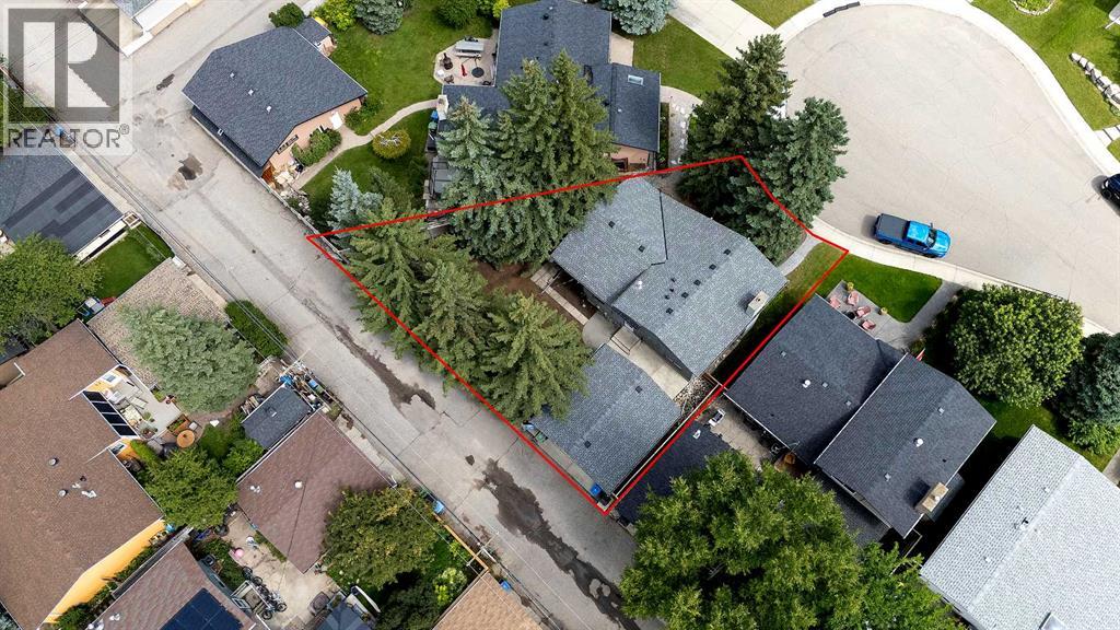 Single Family House 4 Level for Sale in  Lake Acadia Place SE Lake Bonavista Calgary 