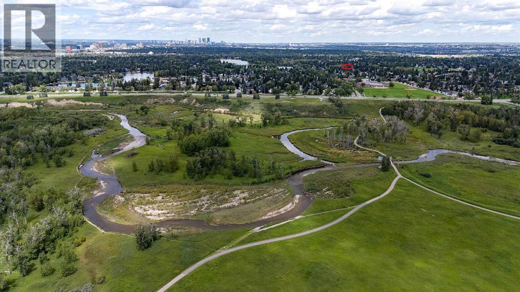 Single Family House 4 Level for Sale in  Lake Acadia Place SE Lake Bonavista Calgary 
