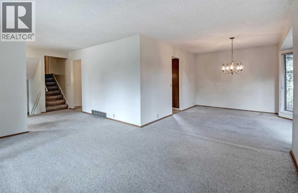 Single Family House 4 Level for Sale in  Lake Acadia Place SE Lake Bonavista Calgary 