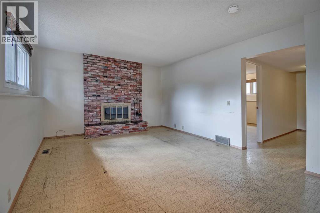 Single Family House 4 Level for Sale in  Lake Acadia Place SE Lake Bonavista Calgary 