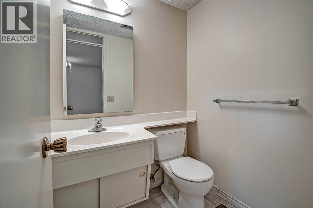 Single Family House 4 Level for Sale in  Lake Acadia Place SE Lake Bonavista Calgary 