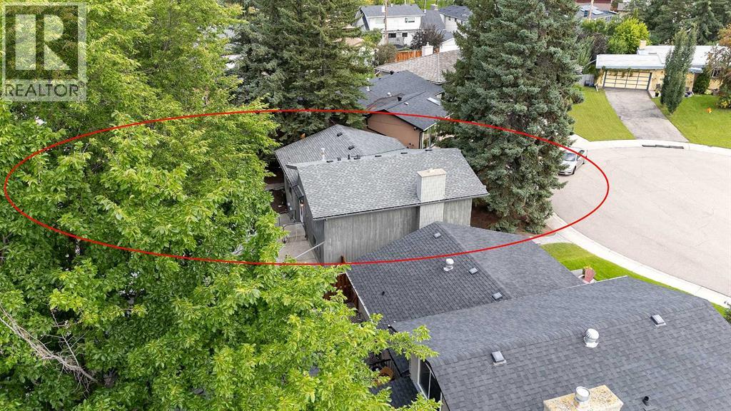 Single Family House 4 Level for Sale in  Lake Acadia Place SE Lake Bonavista Calgary 