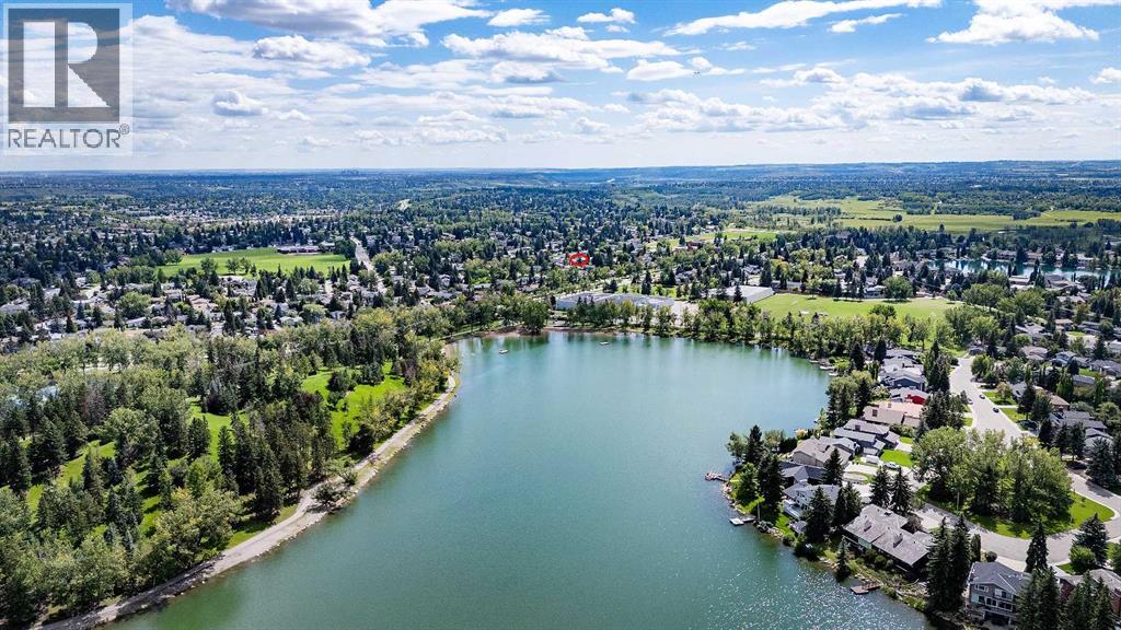 Single Family House 4 Level for Sale in  Lake Acadia Place SE Lake Bonavista Calgary 