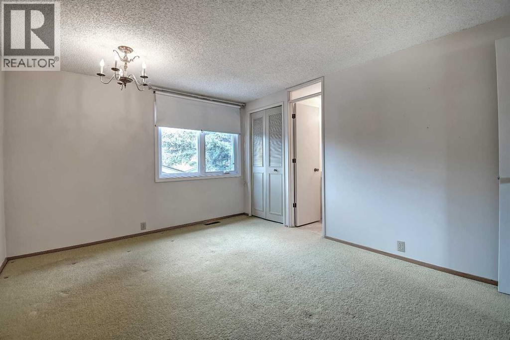 Single Family House 4 Level for Sale in  Lake Acadia Place SE Lake Bonavista Calgary 