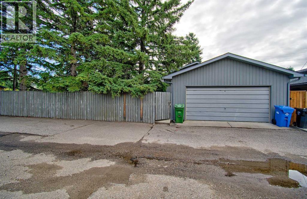 Single Family House 4 Level for Sale in  Lake Acadia Place SE Lake Bonavista Calgary 