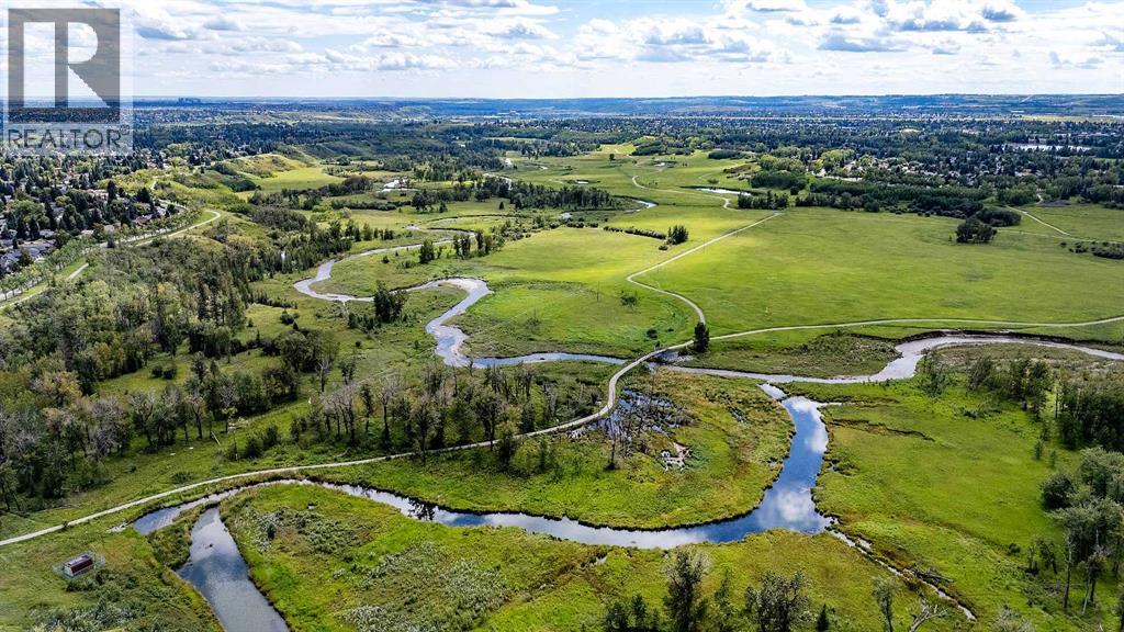 Single Family House 4 Level for Sale in  Lake Acadia Place SE Lake Bonavista Calgary 