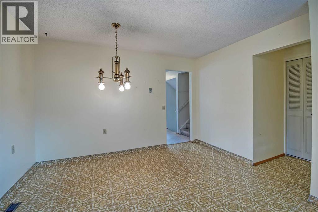 Single Family House 4 Level for Sale in  Lake Acadia Place SE Lake Bonavista Calgary 