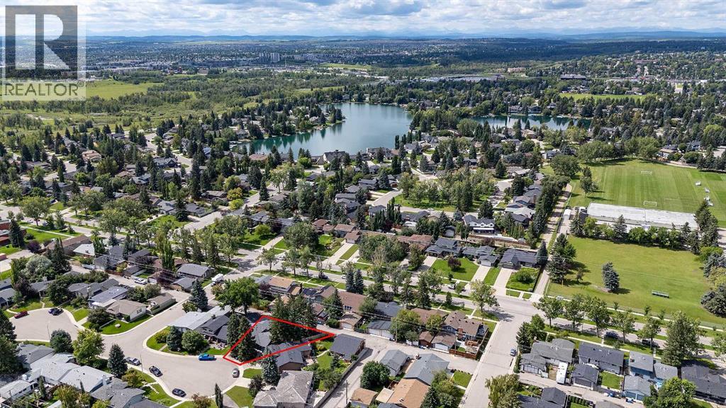 Single Family House 4 Level for Sale in  Lake Acadia Place SE Lake Bonavista Calgary 