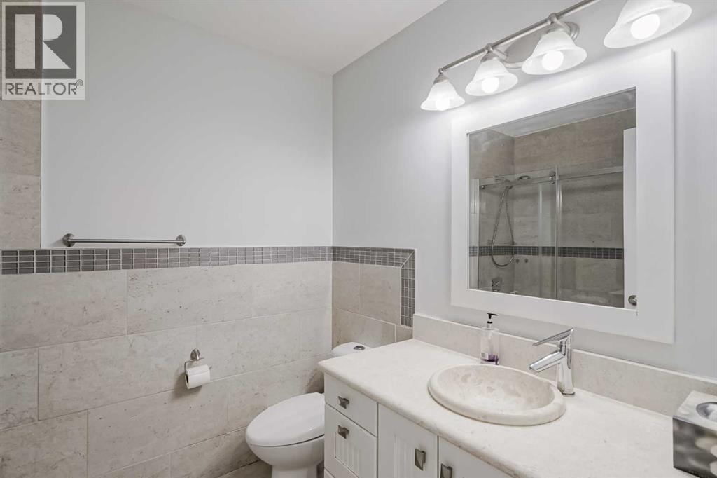 Photo 38 of 208 Woodpark Place Sw, Calgary AB