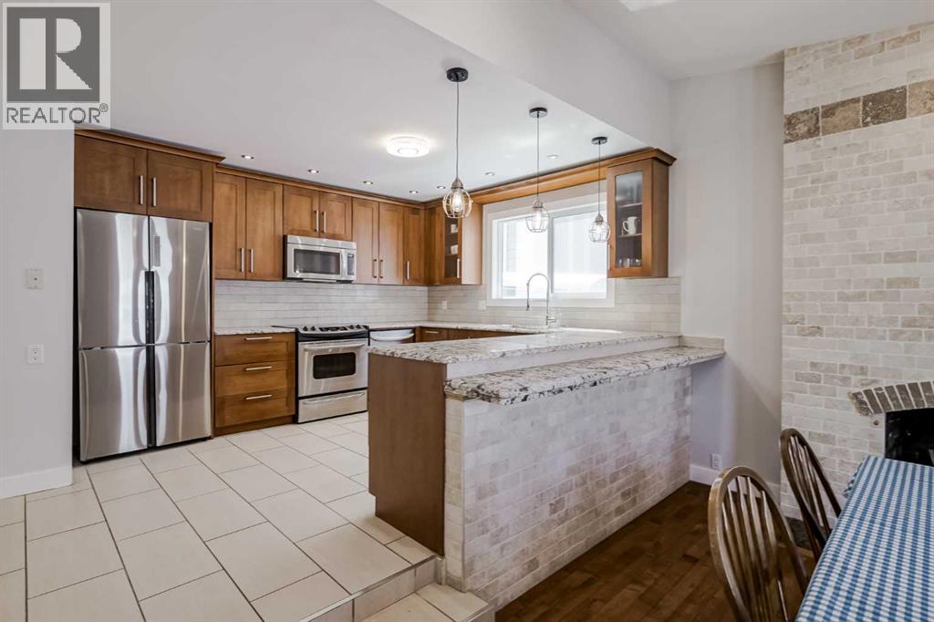 Photo 25 of 208 Woodpark Place Sw, Calgary AB