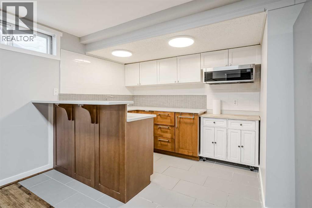 Photo 32 of 208 Woodpark Place Sw, Calgary AB
