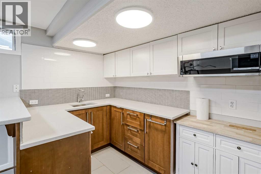 Photo 21 of 208 Woodpark Place Sw, Calgary AB