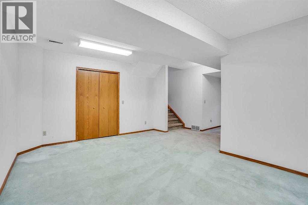 Single Family House 4 Level for Sale in  Del Monica Place NE Monterey Park Calgary 