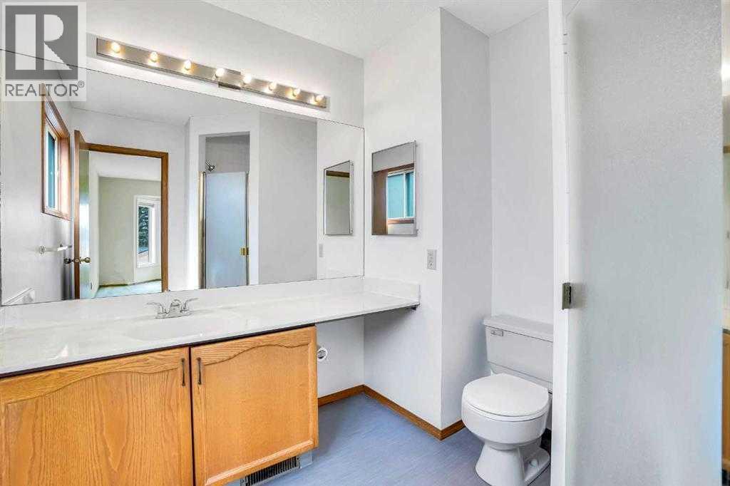 Single Family House 4 Level for Sale in  Del Monica Place NE Monterey Park Calgary 