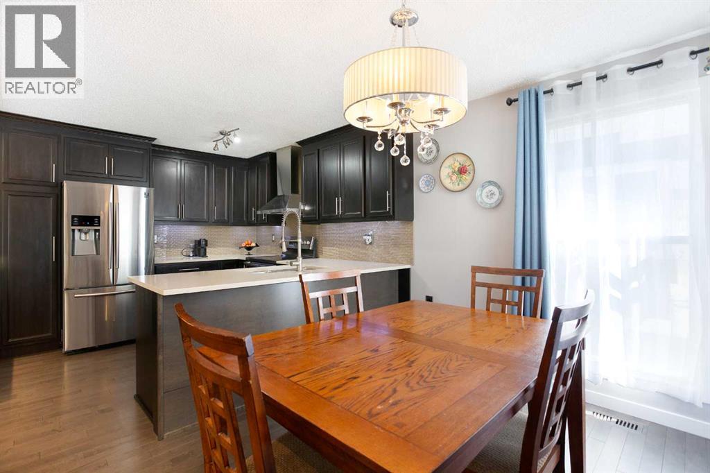 Single Family House 4 Level for Sale in  Strathclair Place SW Strathcona Park Calgary 