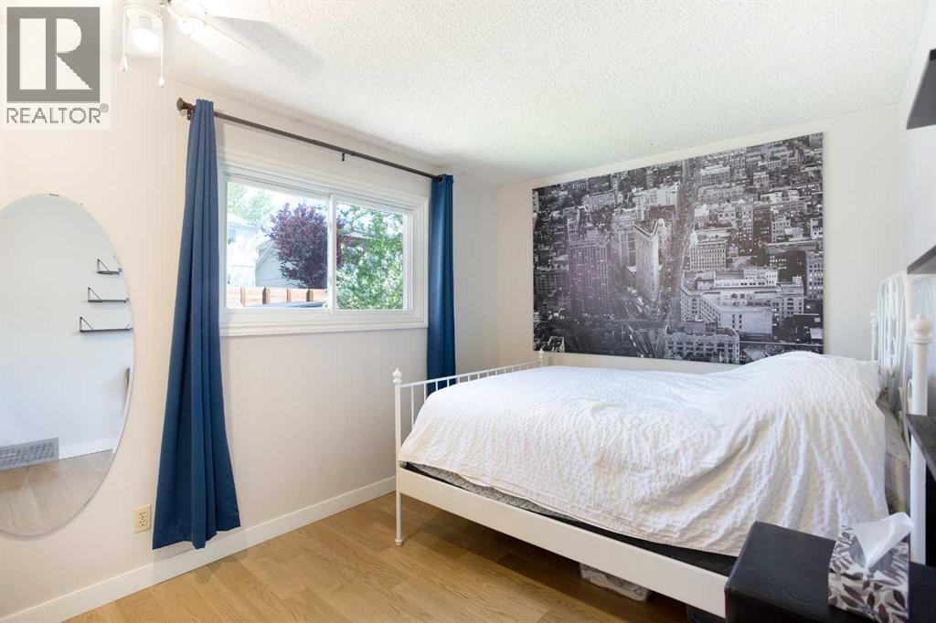 Single Family House 4 Level for Sale in  Strathclair Place SW Strathcona Park Calgary 