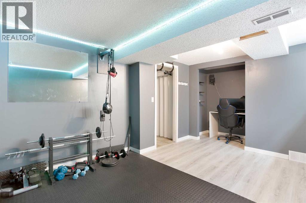 Single Family House 4 Level for Sale in  Strathclair Place SW Strathcona Park Calgary 