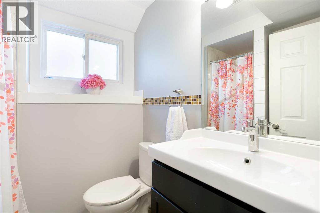 Single Family House 4 Level for Sale in  Strathclair Place SW Strathcona Park Calgary 