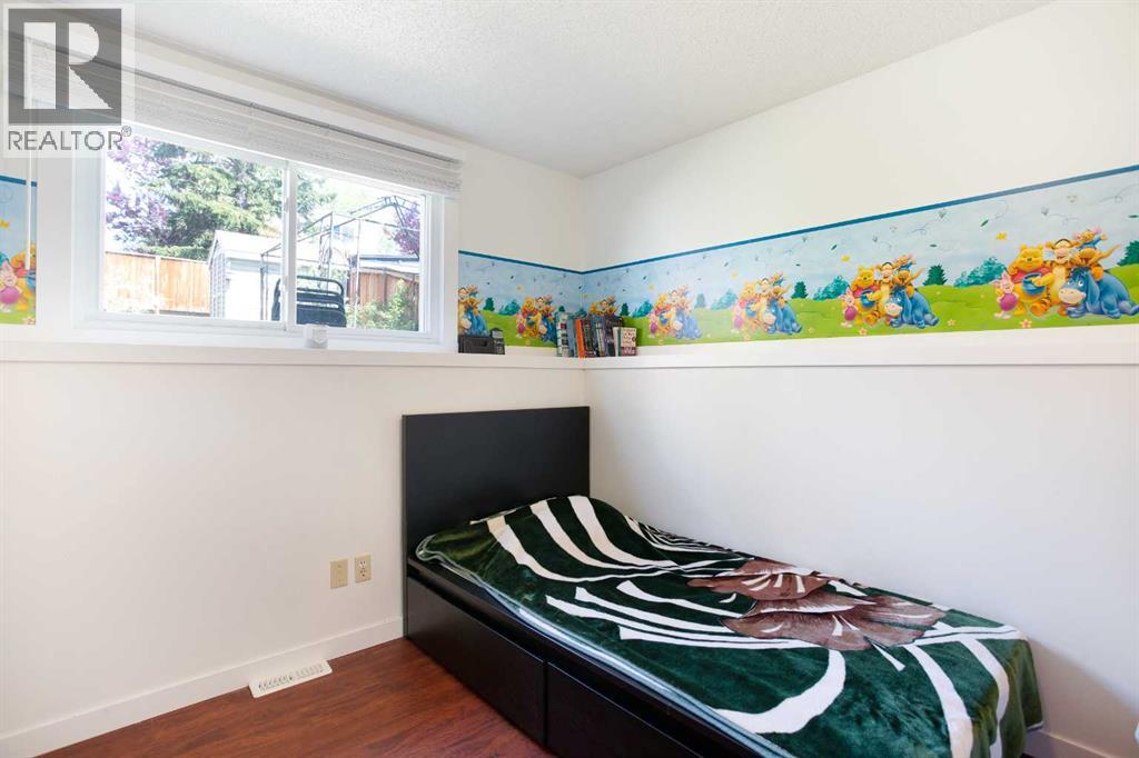 Single Family House 4 Level for Sale in  Strathclair Place SW Strathcona Park Calgary 