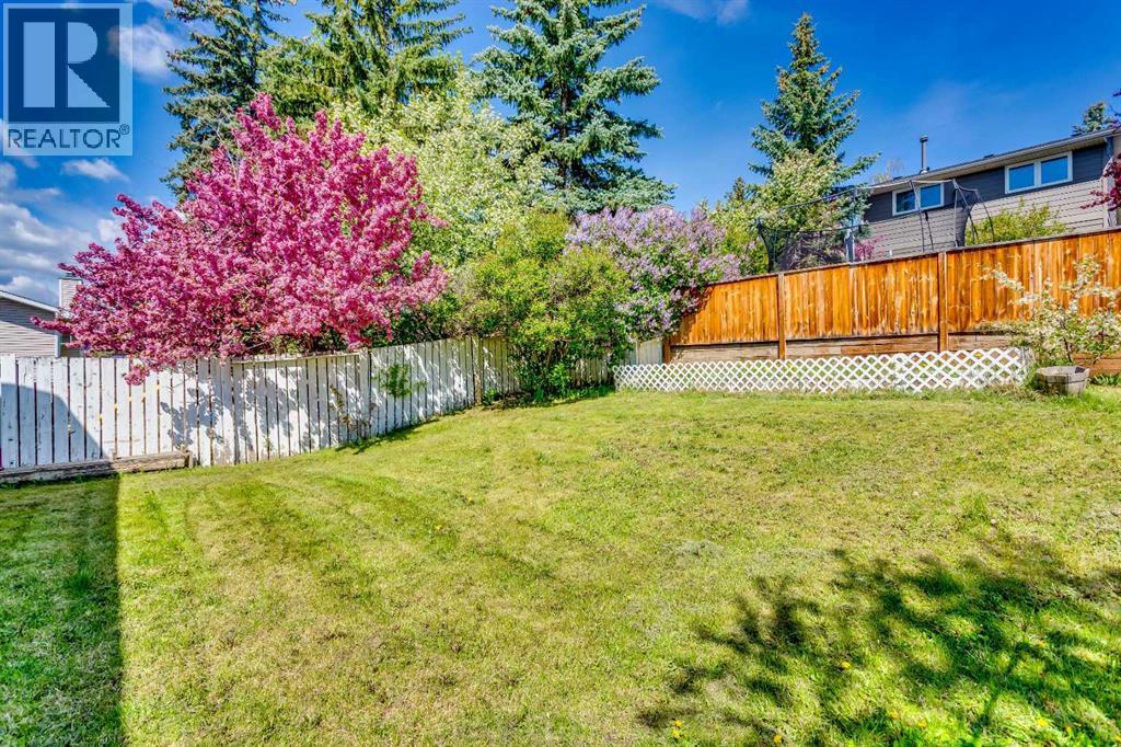 Single Family House 4 Level for Sale in  Strathclair Place SW Strathcona Park Calgary 