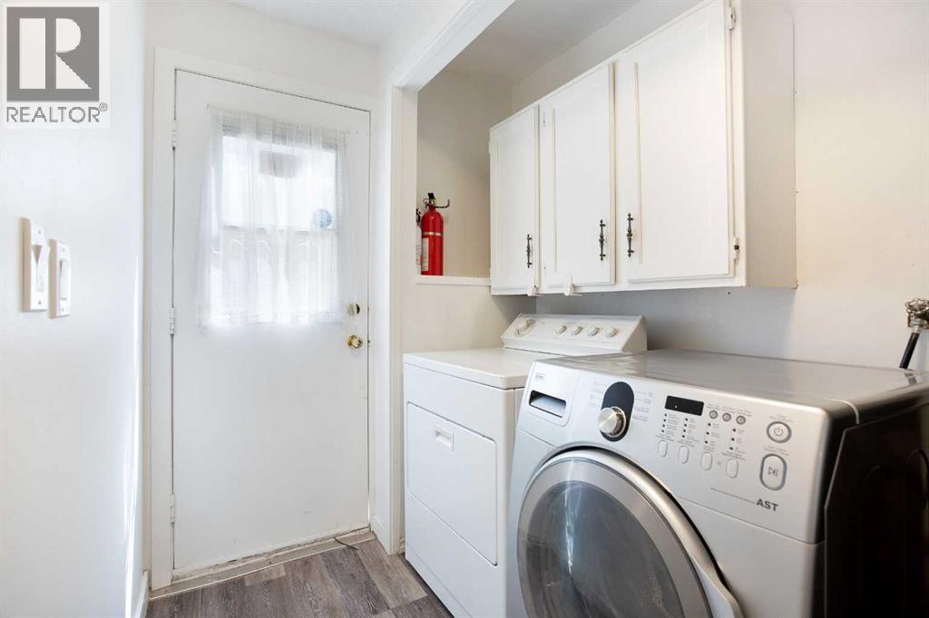 Single Family House 4 Level for Sale in  Strathclair Place SW Strathcona Park Calgary 