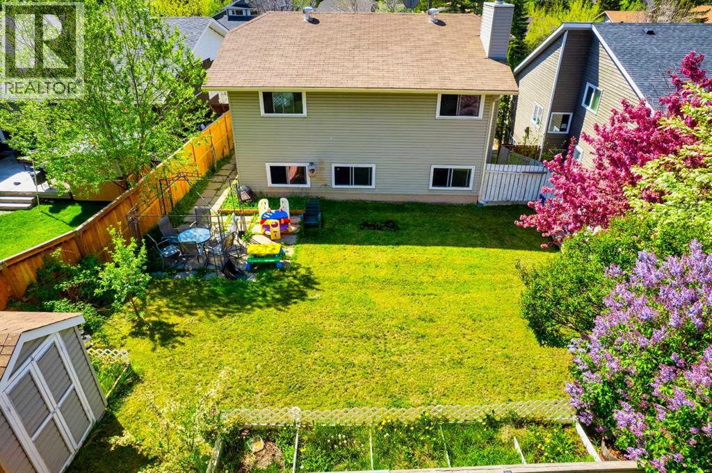Single Family House 4 Level for Sale in  Strathclair Place SW Strathcona Park Calgary 