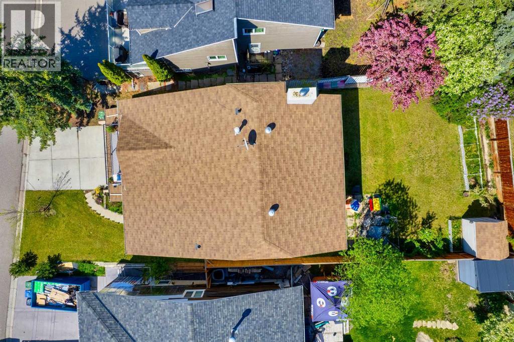 Single Family House 4 Level for Sale in  Strathclair Place SW Strathcona Park Calgary 