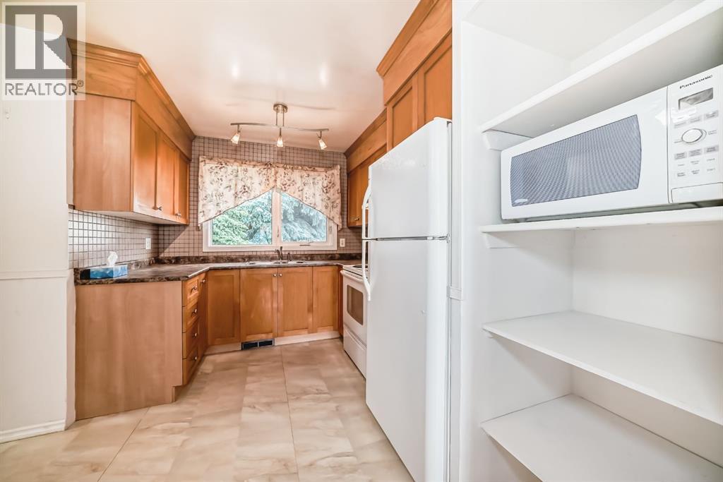 Single Family House Bi-level for Sale in  Marshall Road NE Marlborough Calgary 