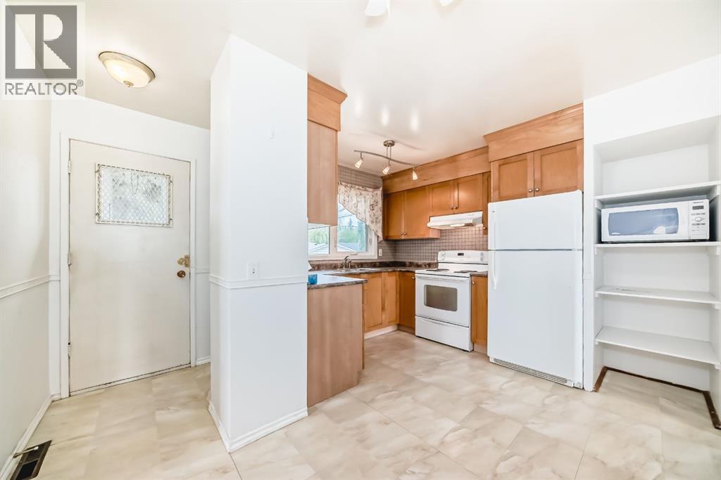 Single Family House Bi-level for Sale in  Marshall Road NE Marlborough Calgary 