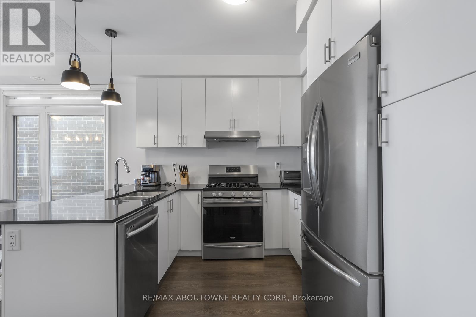 Photo 7 of 1421 Clarriage Court, Milton ON