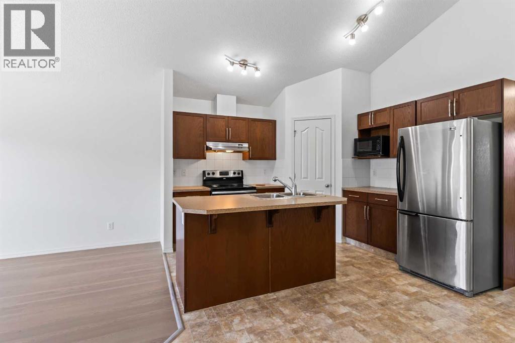 Single Family House Bungalow for Sale in  Autumn Green SE Auburn Bay Calgary 