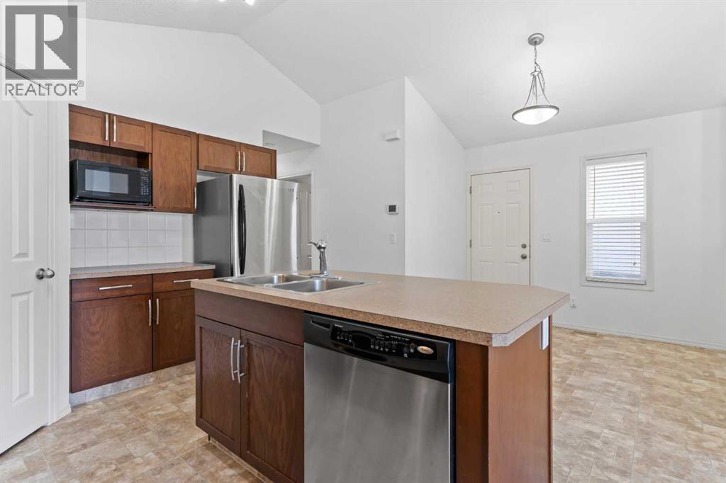 Single Family House Bungalow for Sale in  Autumn Green SE Auburn Bay Calgary 