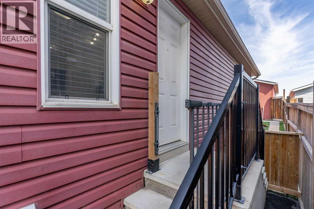 Single Family House Bungalow for Sale in  Autumn Green SE Auburn Bay Calgary 