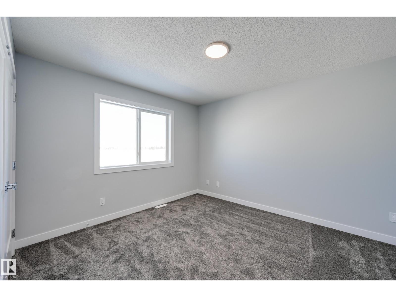 Photo 30 of 10214 92 A Av, Morinville AB