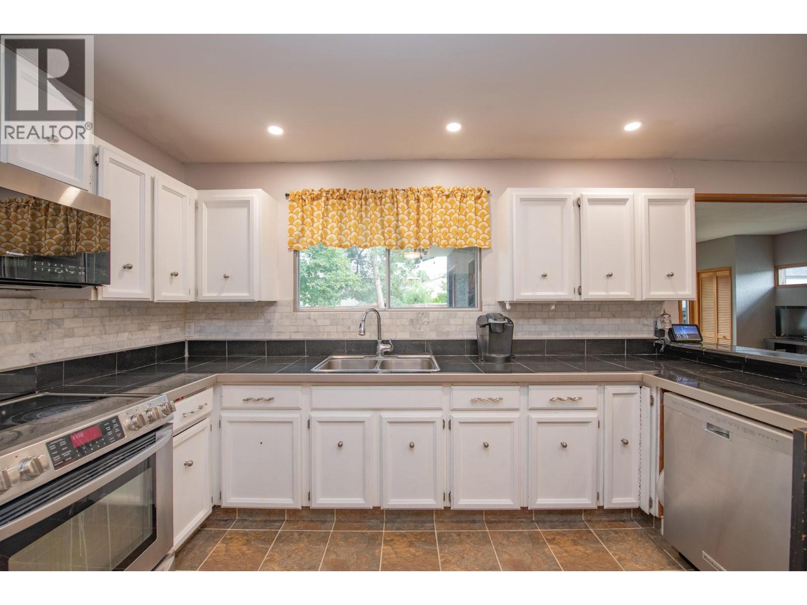 Photo 45 of 1390 Cornwall Road, Kelowna BC