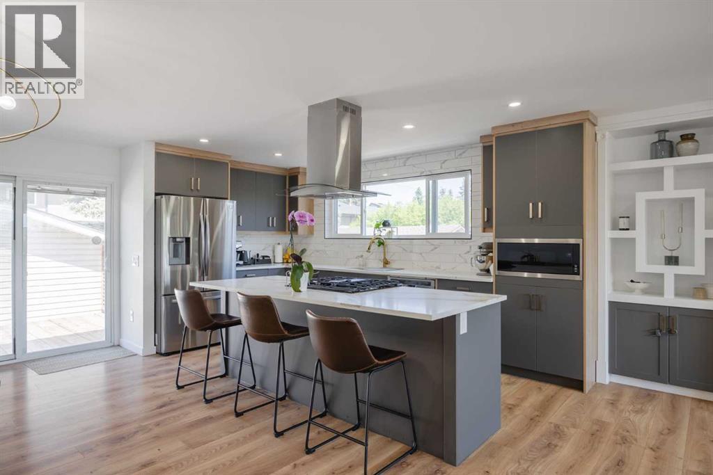 Single Family House Bi-level for Sale in  Cantrell Drive SW Canyon Meadows Calgary 