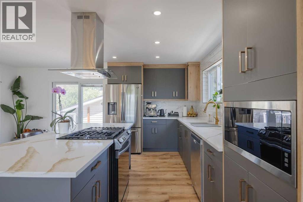 Single Family House Bi-level for Sale in  Cantrell Drive SW Canyon Meadows Calgary 