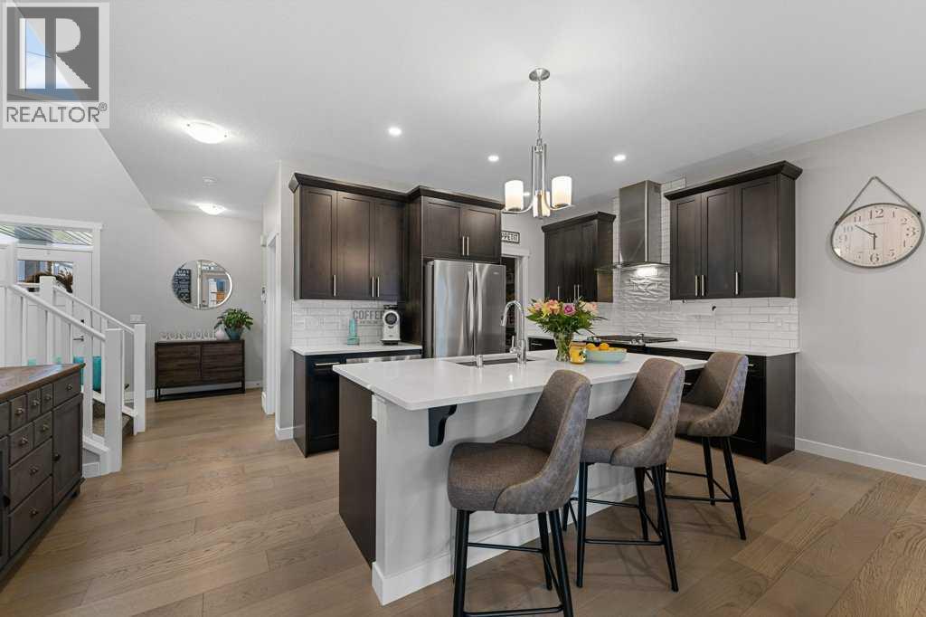 Single Family House for Sale in  Belmont Crescent SW Belmont Calgary 