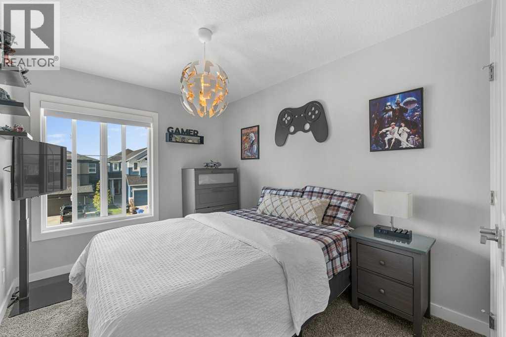 Single Family House for Sale in  Belmont Crescent SW Belmont Calgary 