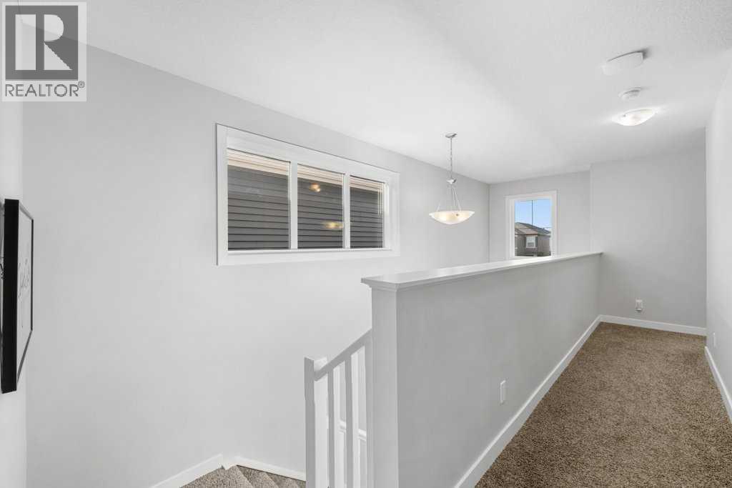 Single Family House for Sale in  Belmont Crescent SW Belmont Calgary 