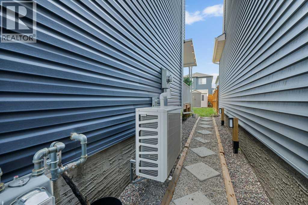 Single Family House for Sale in  Belmont Crescent SW Belmont Calgary 