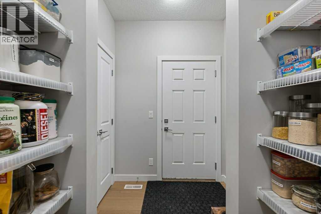 Single Family House for Sale in  Belmont Crescent SW Belmont Calgary 