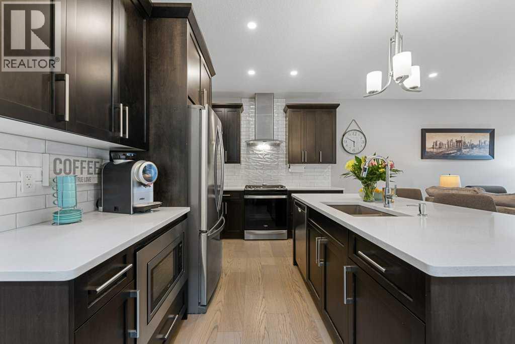 Single Family House for Sale in  Belmont Crescent SW Belmont Calgary 