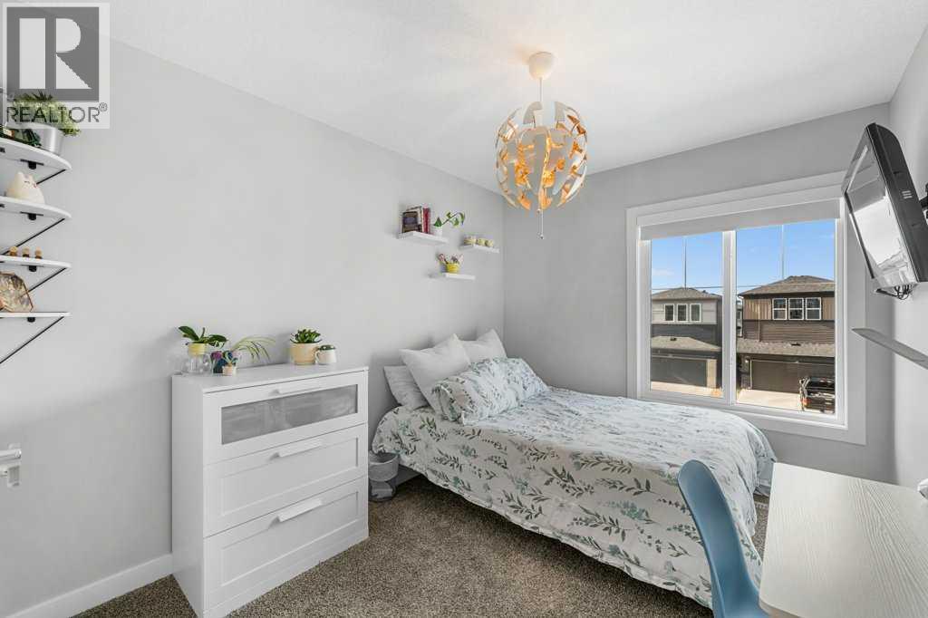 Single Family House for Sale in  Belmont Crescent SW Belmont Calgary 